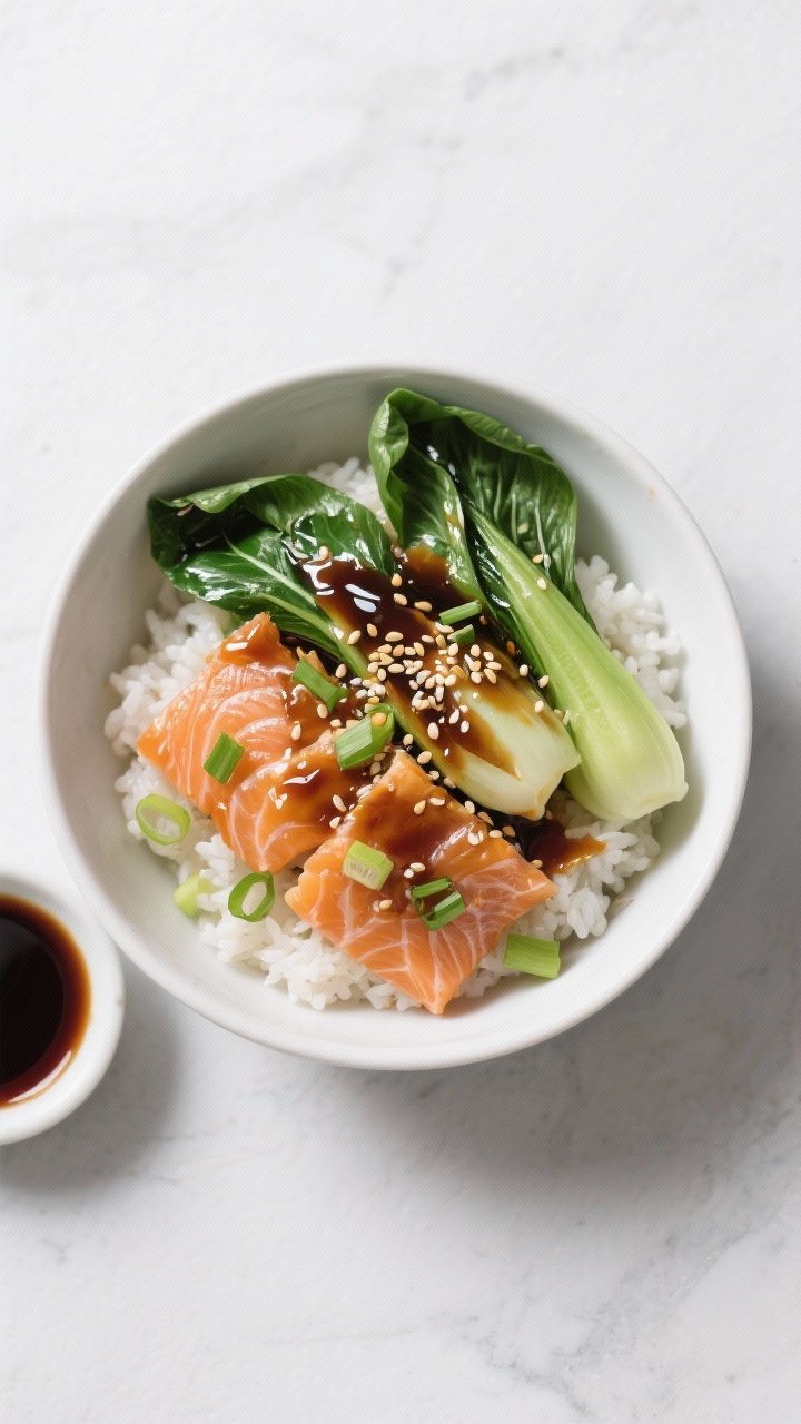 Tasty top view: Overhead bowl build featuring a rice base topped with glistening soy-glazed bok choy