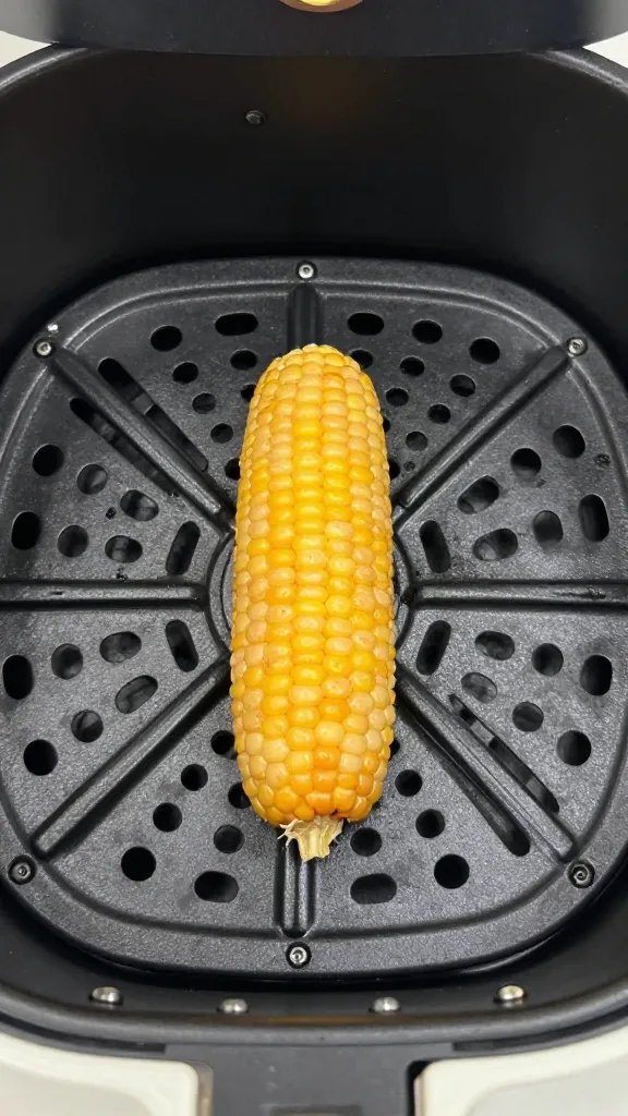 air fryer basket with one mini corn dog center