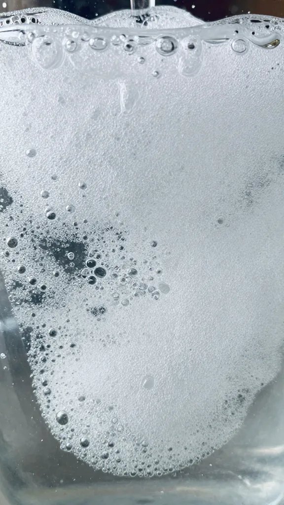 closeup of fizz bubbles rising in slush