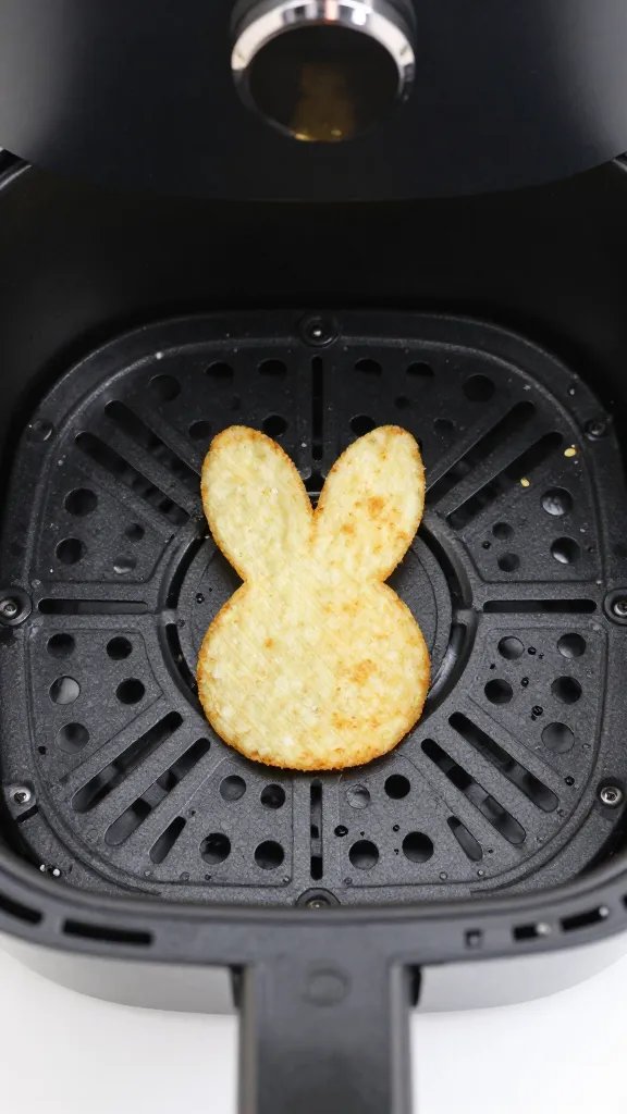 air fryer basket with one bunny chip centered
