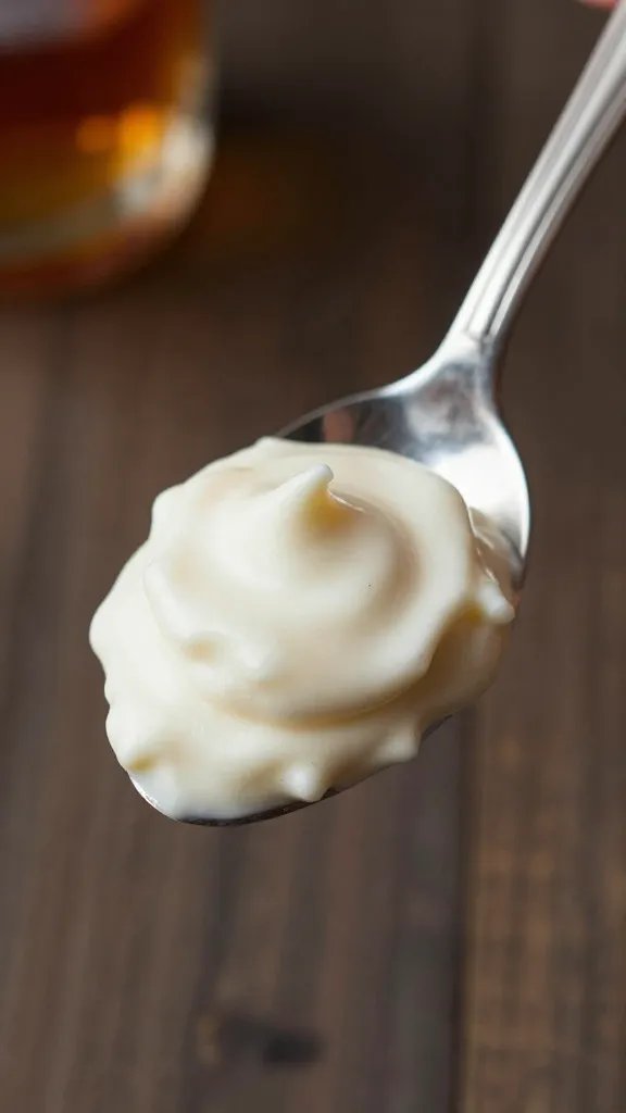 dollop of bourbon whipped dip on silver spoon